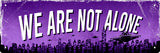 We Are Not Alone  Tin Sign